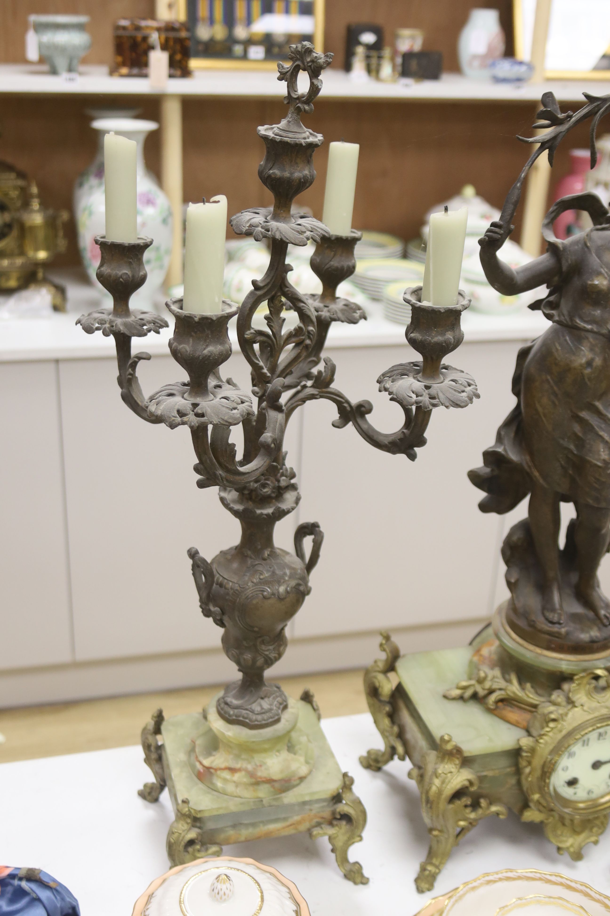 A 19th century French spelter and onyx clock garniture, height 61cm